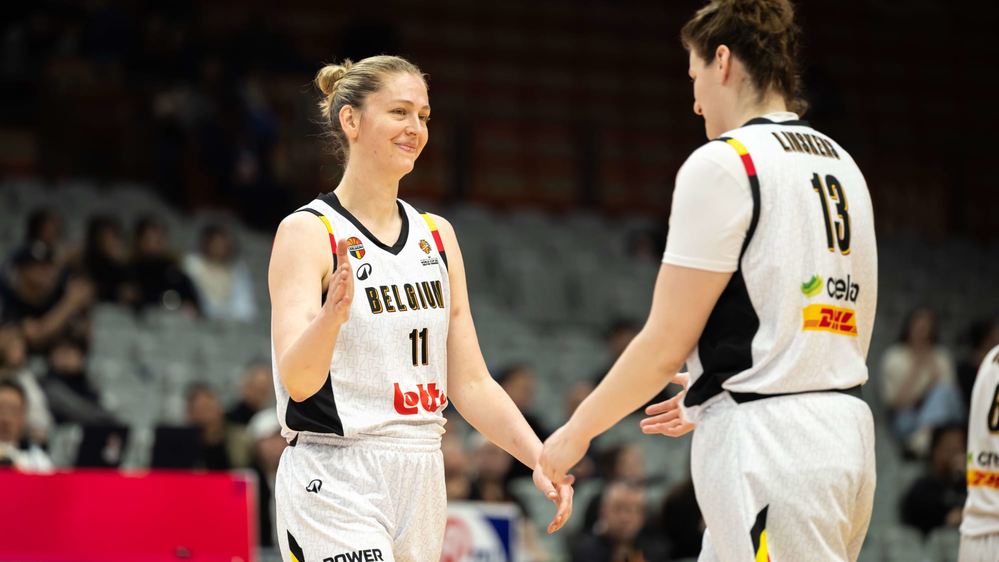 Emma Meesseman and a Belgium teammate during official FIBA coverage