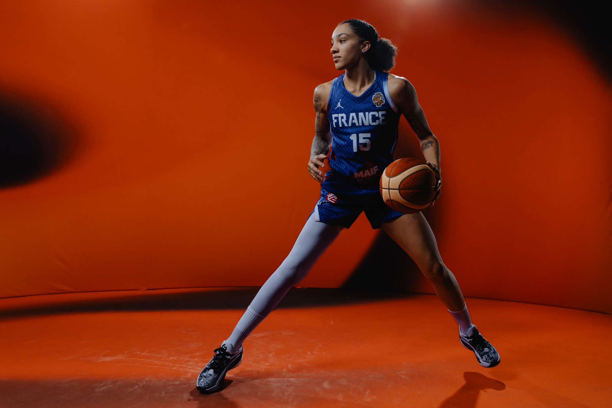 Gabby Williams posing in her France uniform