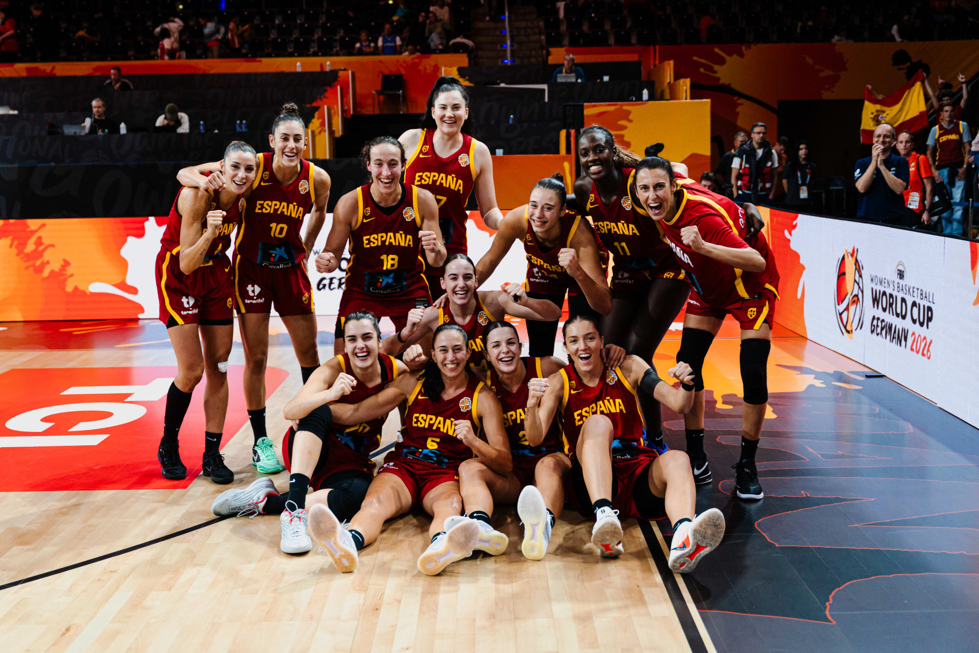 Spain celebrating after qualifying directly for the quarterfinals